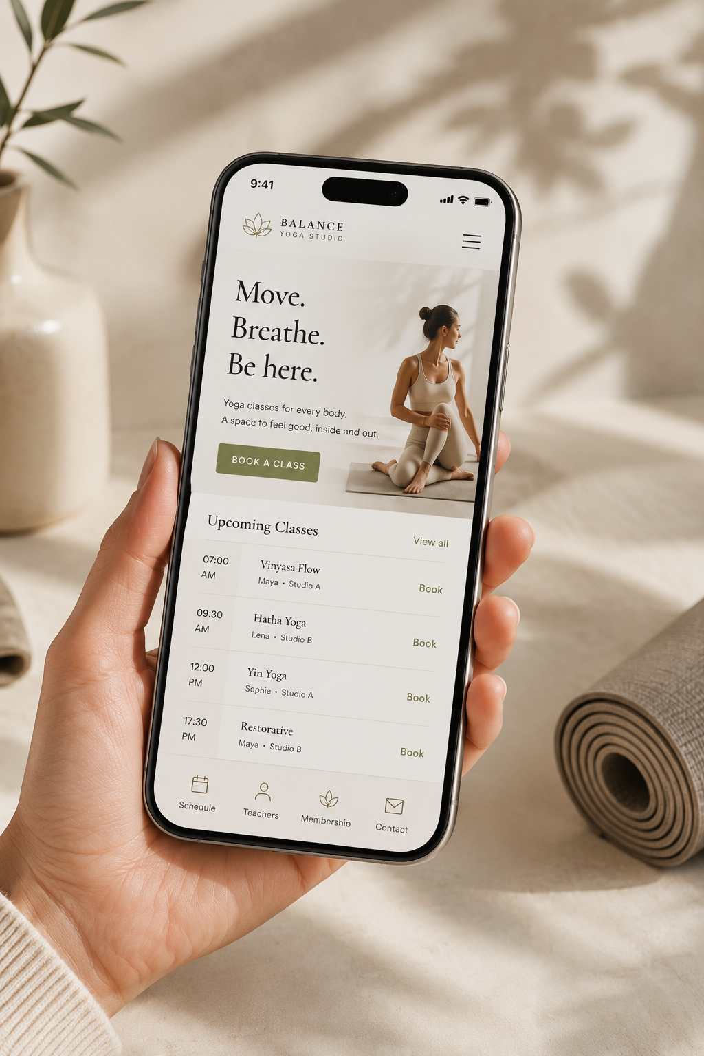 Luxury yoga website displayed on a mobile phone screen